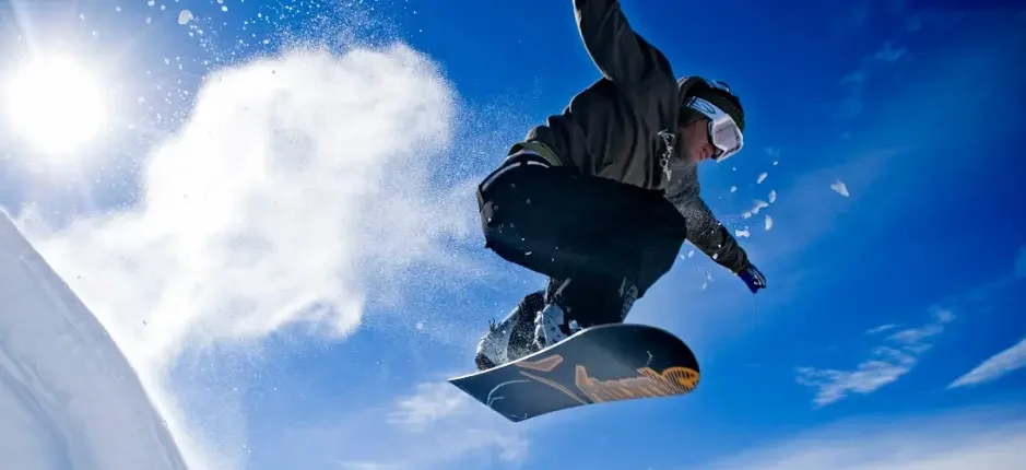 Argentina Ski trip and vacation. Snowboarder in Bariloche