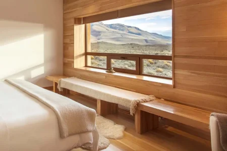 A spacious room with breathtaking mountain views, perfect for relaxation.