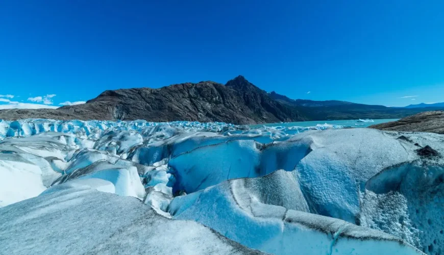 Panoramic scenes of Viedma Glacier reveal its vast, icy expanse.